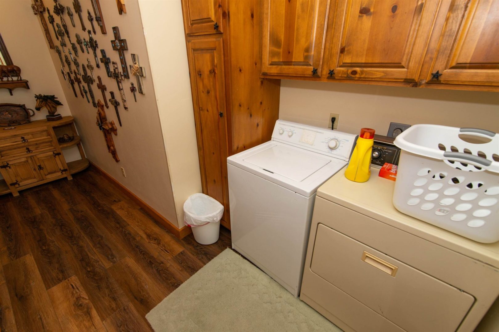 A laundry room with a washer and dryer.