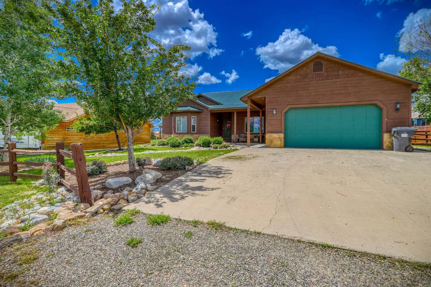 A home with a driveway and a garage.