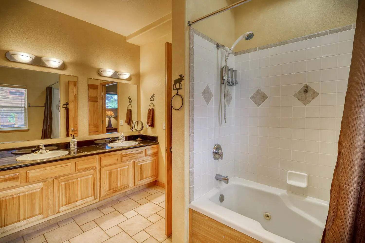 Beautiful house with a wash basin along with a bathtub