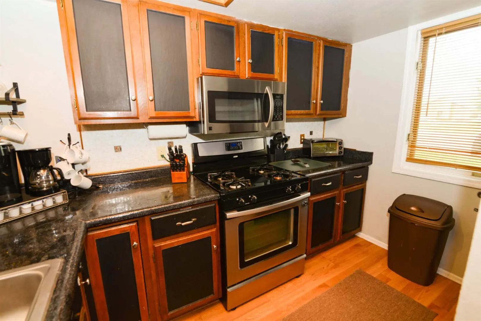 A kitchen with stainless steel appliances.