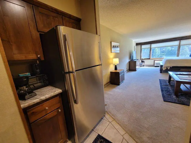 A kitchen or kitchenette in a hotel room.