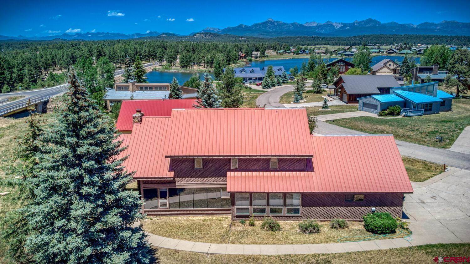 Top view of an orange color house in an area