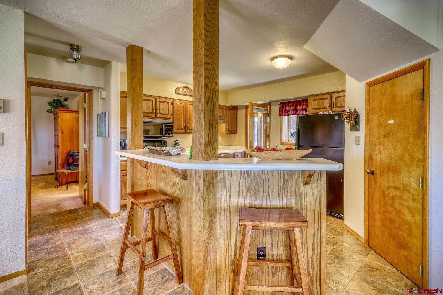 Inside view of a house with so many lights and a chair