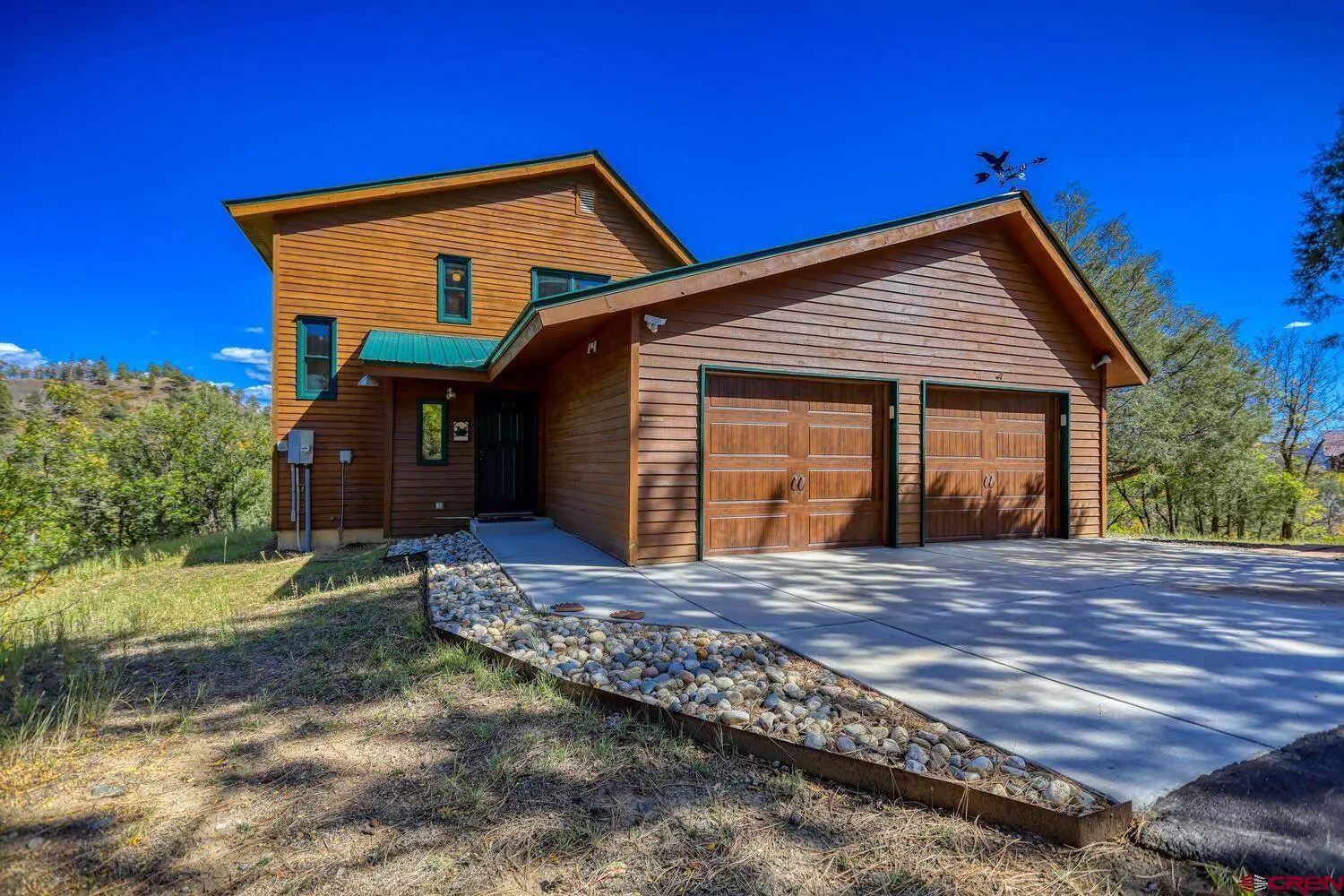 Wooden design house along with some trees