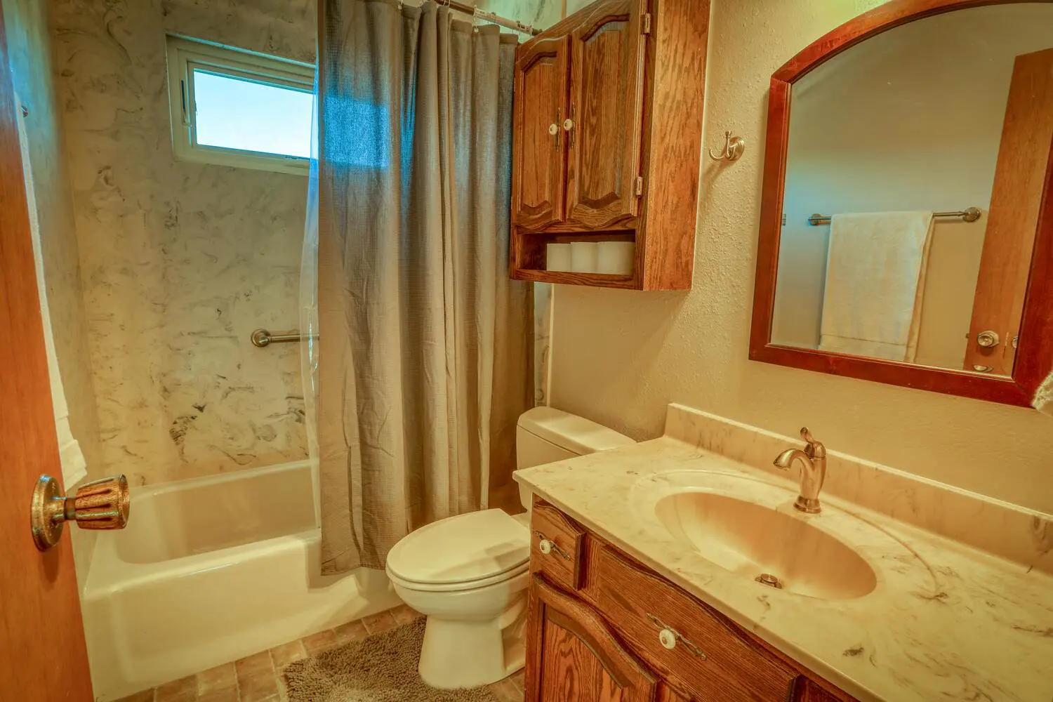 A beautiful bowl wash basin inside a toilet and mirror