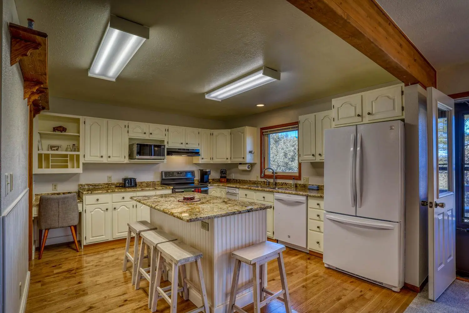 Beautiful house with a kitchen set and refrigerator