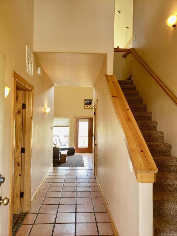 an entry passage of a house with staircase