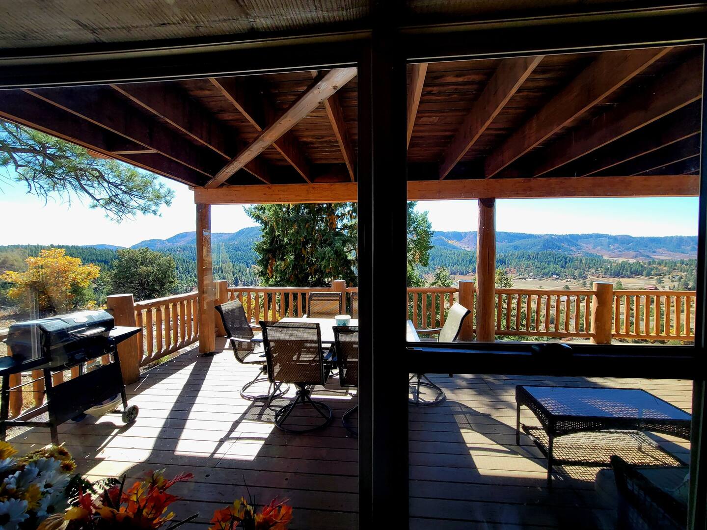 A view of the mountains from a deck.